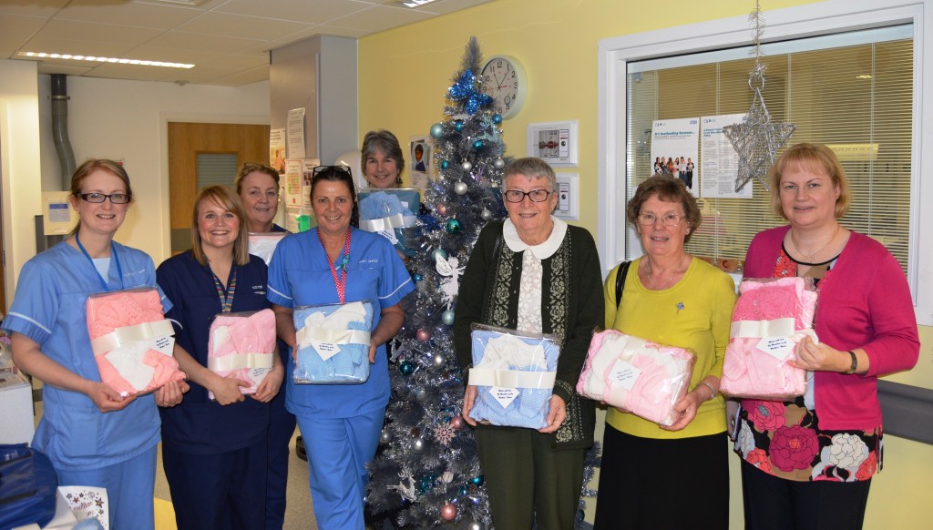 A large group of women around a Christmas tree in the Neonatal Unit of Blackpool Hospital