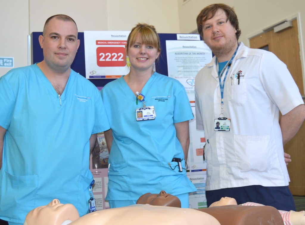Three medics with resuscitation equipment