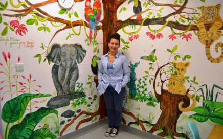 Ellie Jakeman and her mural at Clifton Hospital