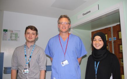 Medical students Daniel James and Mariam Gaddah with Cardiothoracic Consultant, Mr Antony Walker, at Blackpool Victoria Hospital.