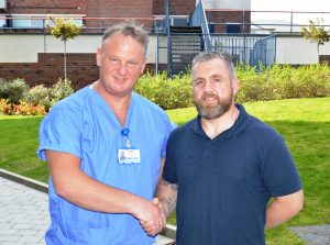 Peter Mowbray with Darren Fisher at Blackpool Victoria Hospital