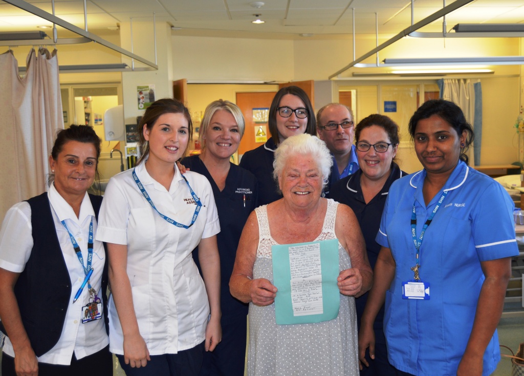 Mary Kane with her poem and staff on Ward 19