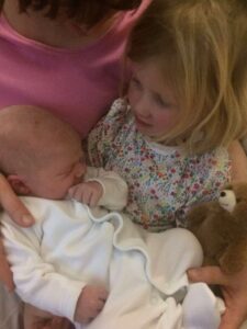 Newborn baby, Elliott John Selby, with sister Eve