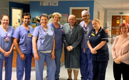 Members of the surgical team with the patient